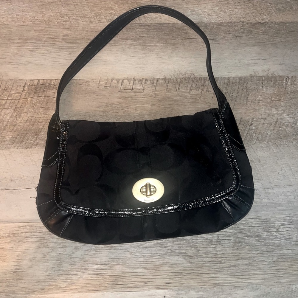 Black Coach purse with real leather.